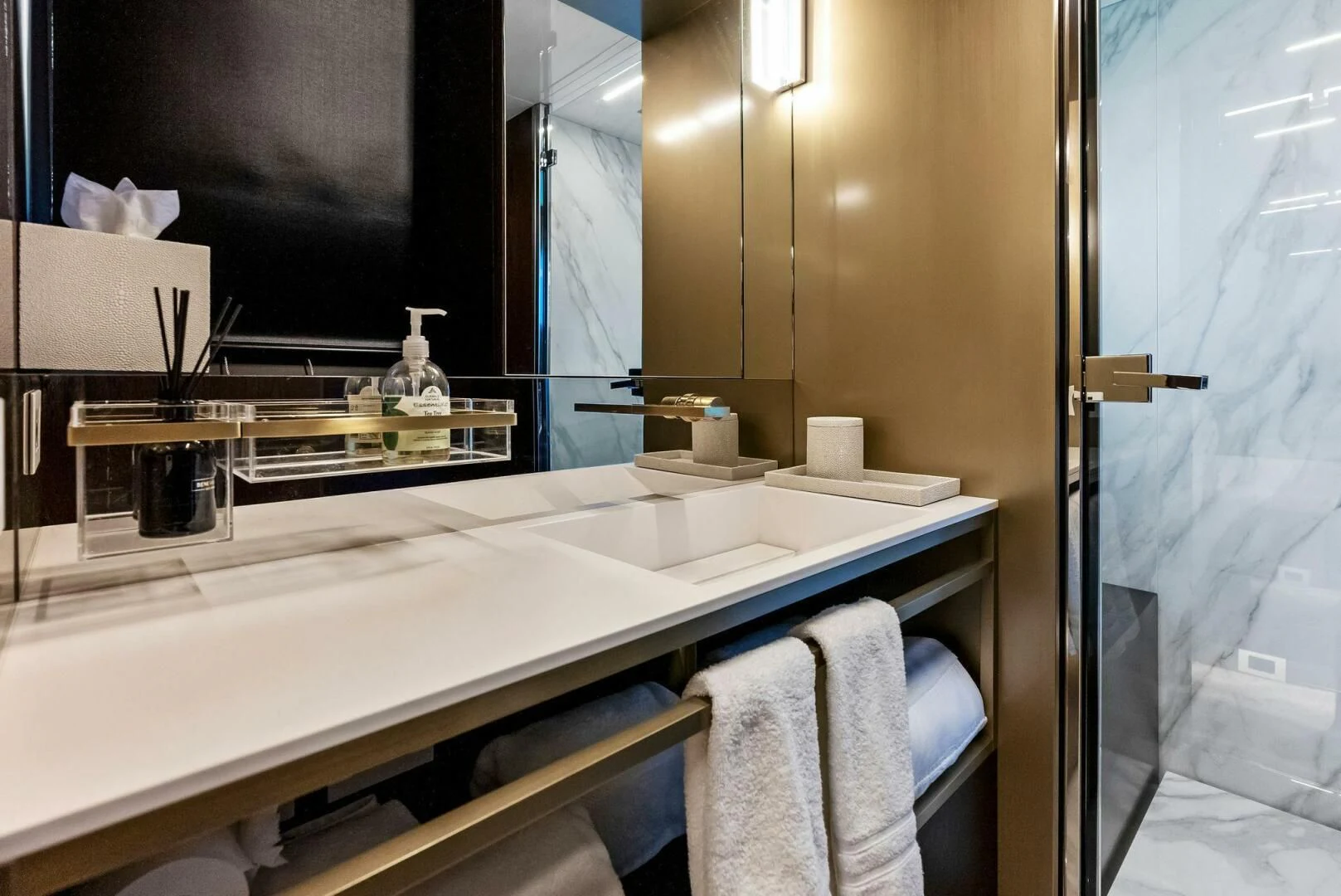a bathroom with a sink and a mirror aboard INEA Yacht for Sale