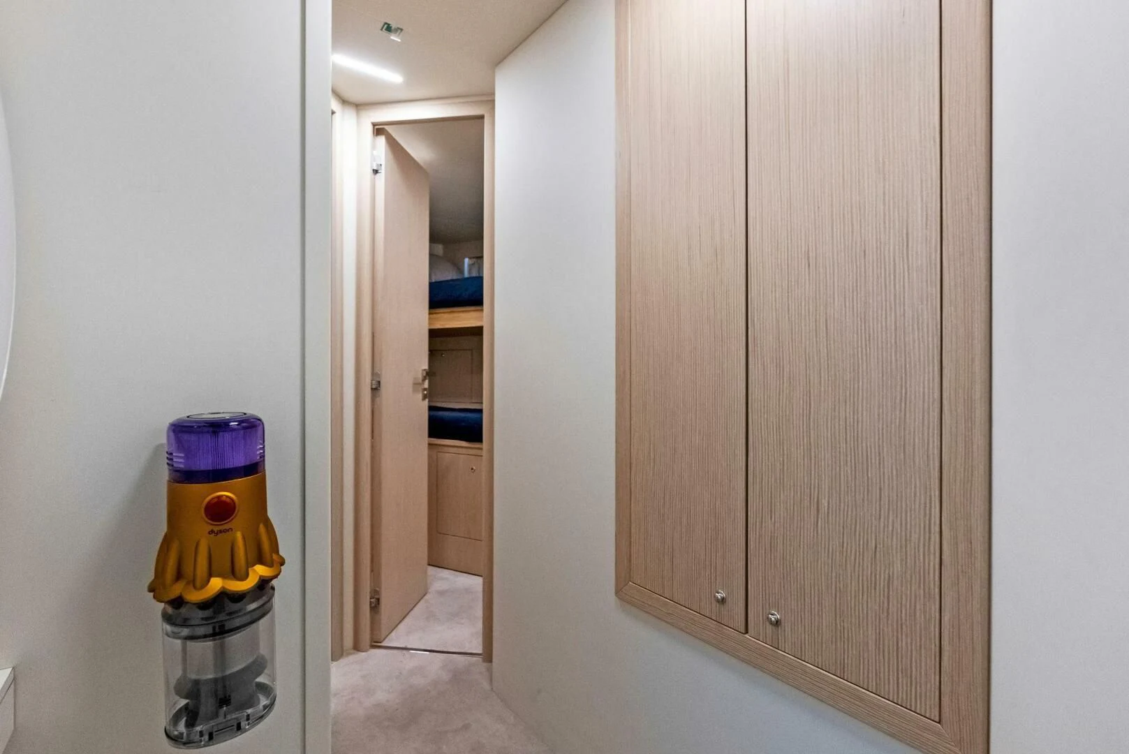 a yellow toy truck in a room aboard INEA Yacht for Sale