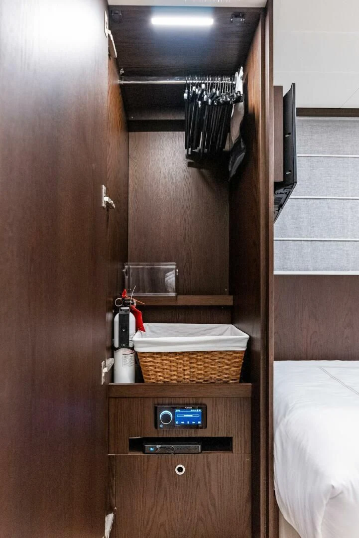 a wooden cabinet in a bathroom aboard INEA Yacht for Sale