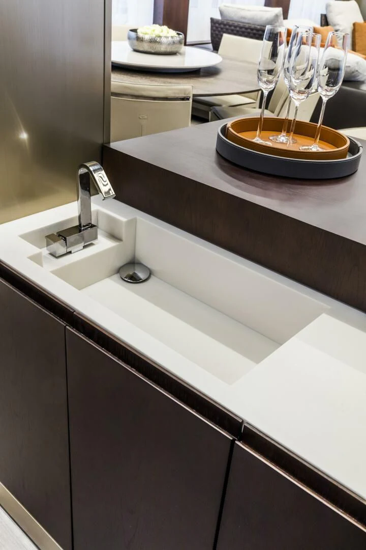 a wine glass on a counter aboard INEA Yacht for Sale