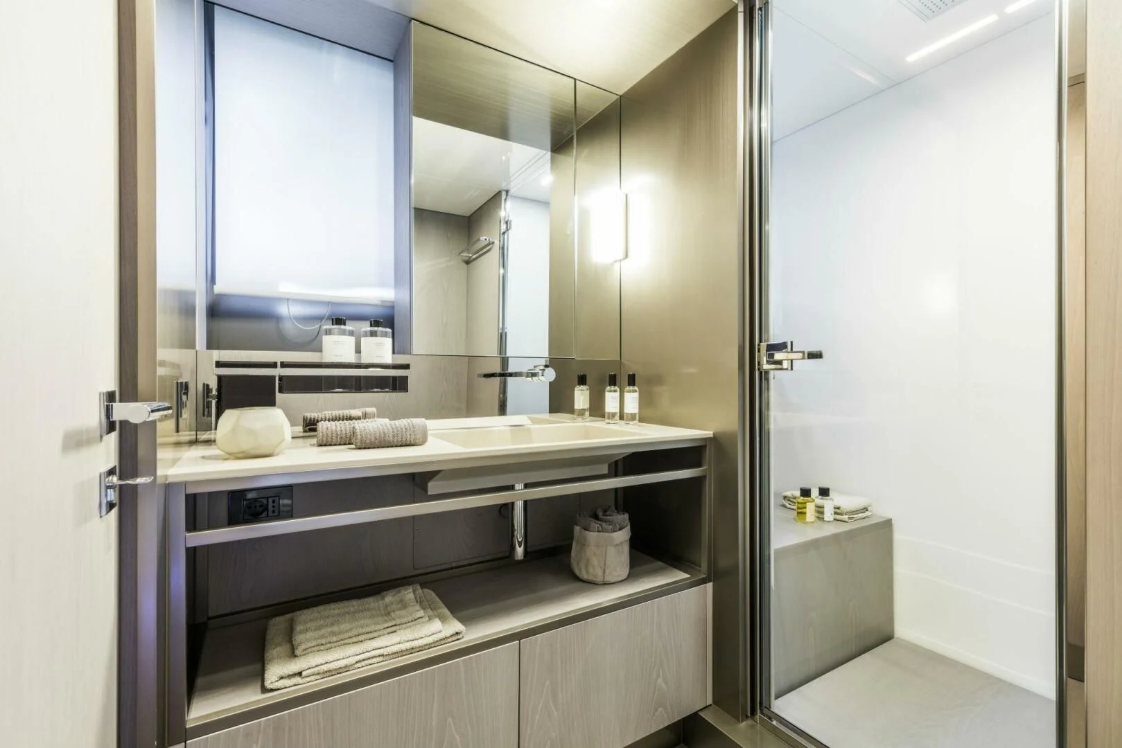 a bathroom with a large mirror aboard INEA Yacht for Sale