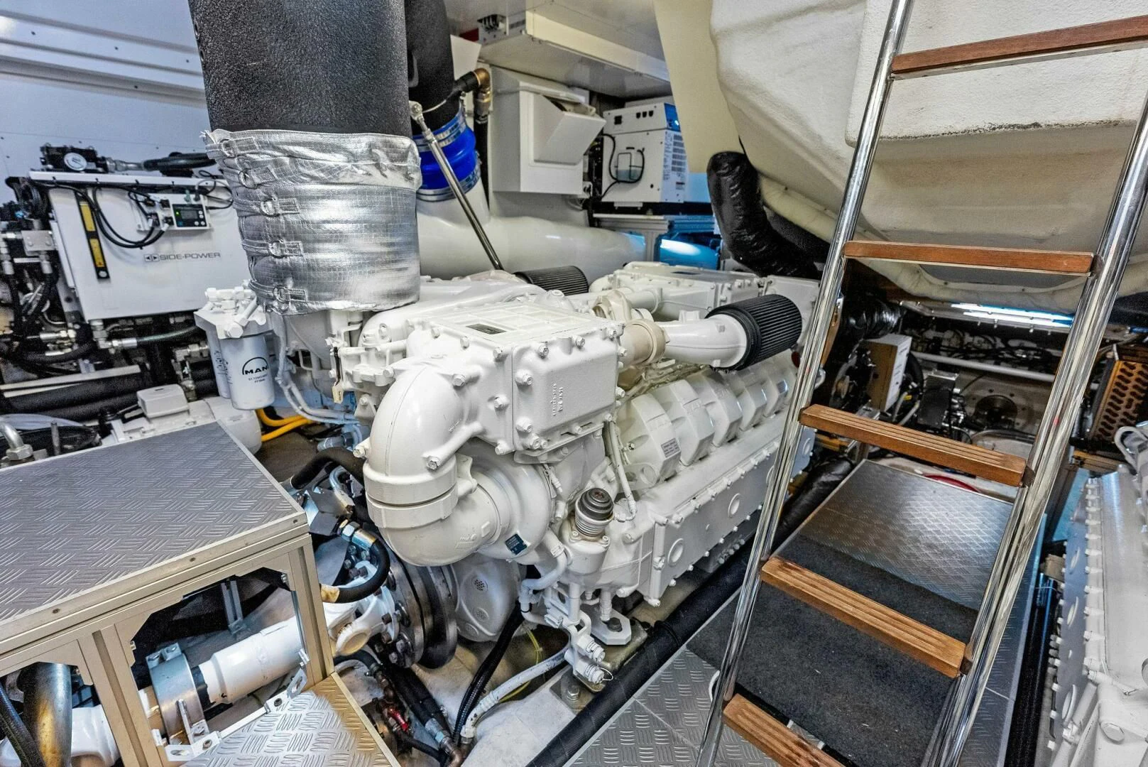 a machine with a large piece of equipment in it aboard INEA Yacht for Sale