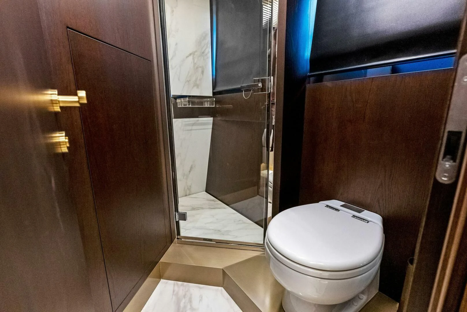 a bathroom with a toilet and a shower aboard INEA Yacht for Sale