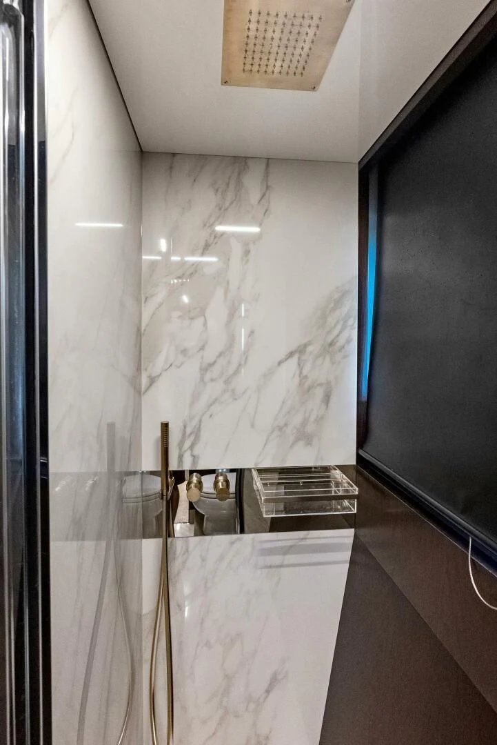 a shower with a glass door aboard INEA Yacht for Sale