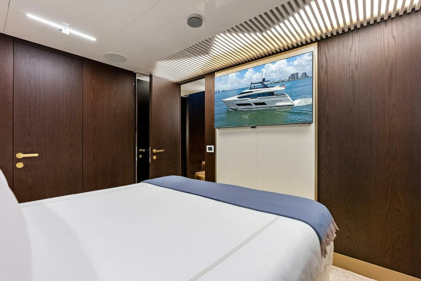a bed in a room aboard INEA Yacht for Sale