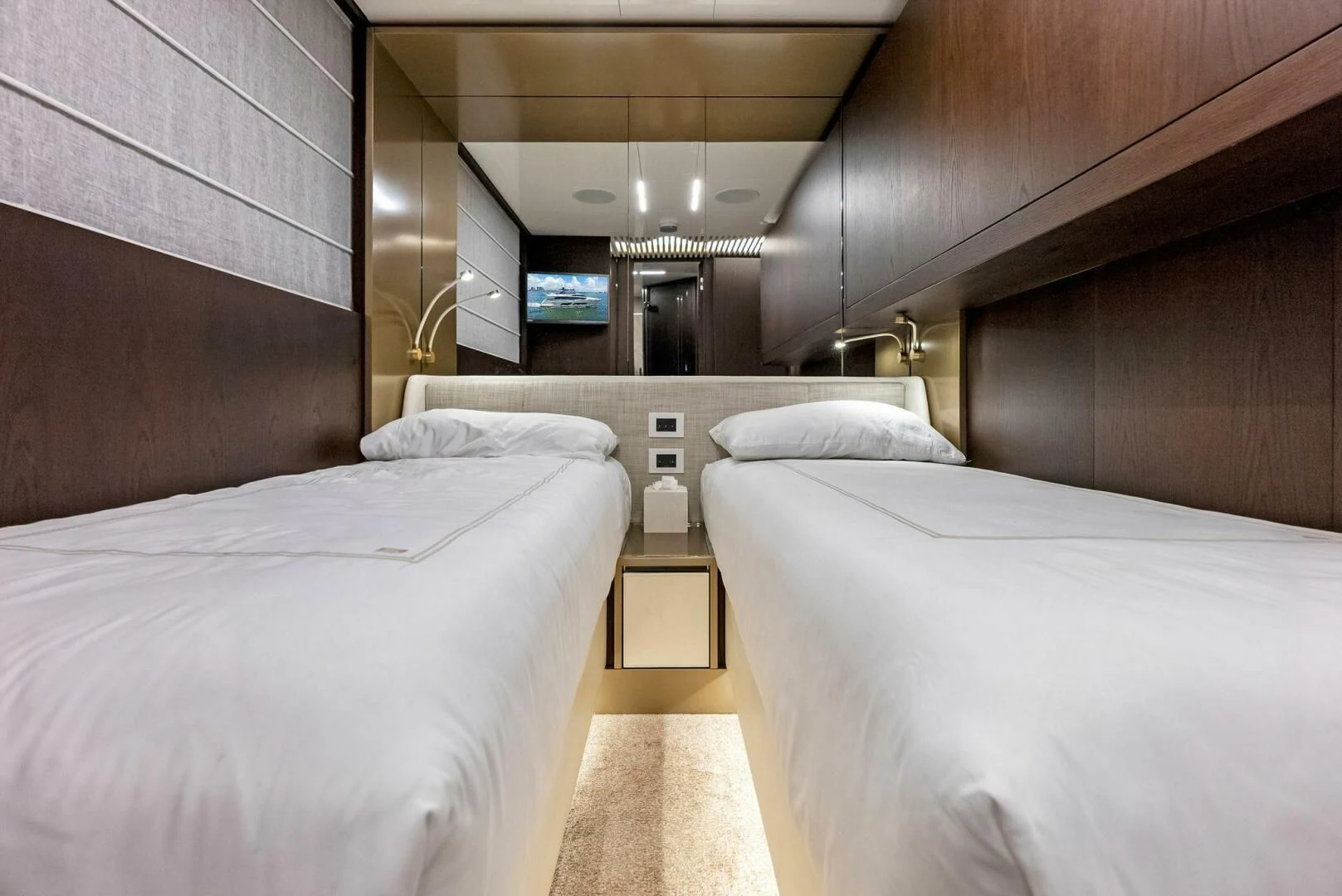 a room with two beds aboard INEA Yacht for Sale