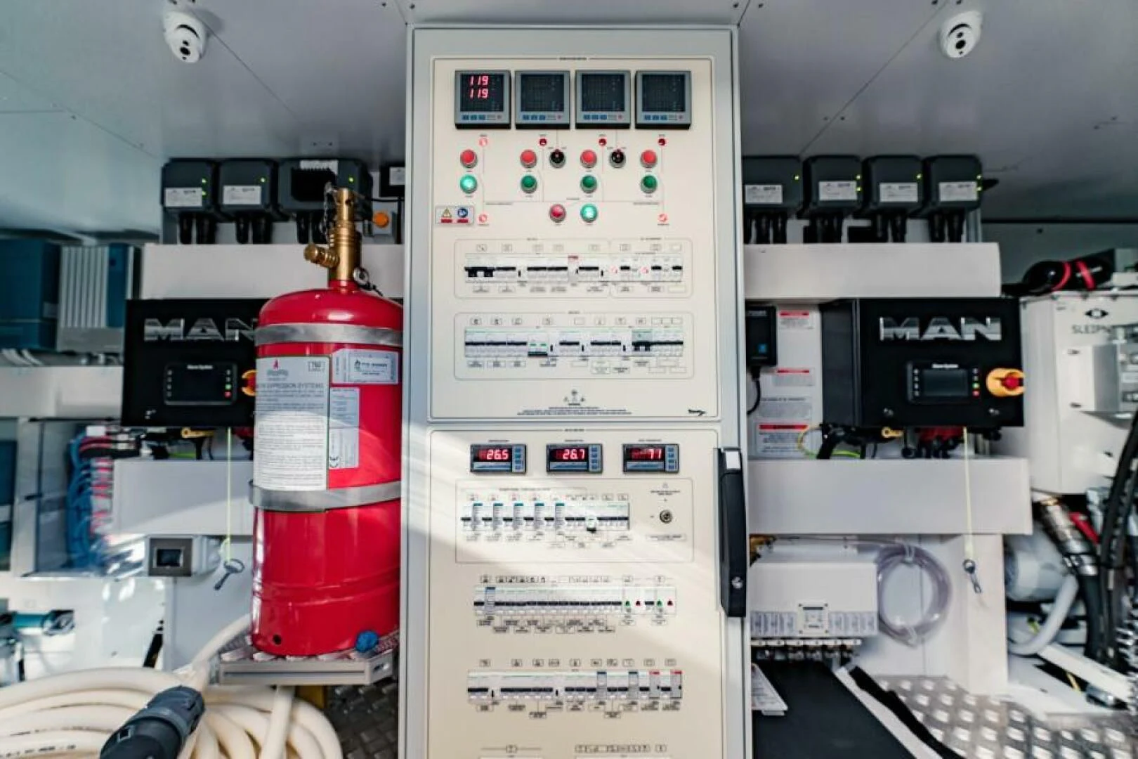 a computer tower with a red and white display aboard INEA Yacht for Sale
