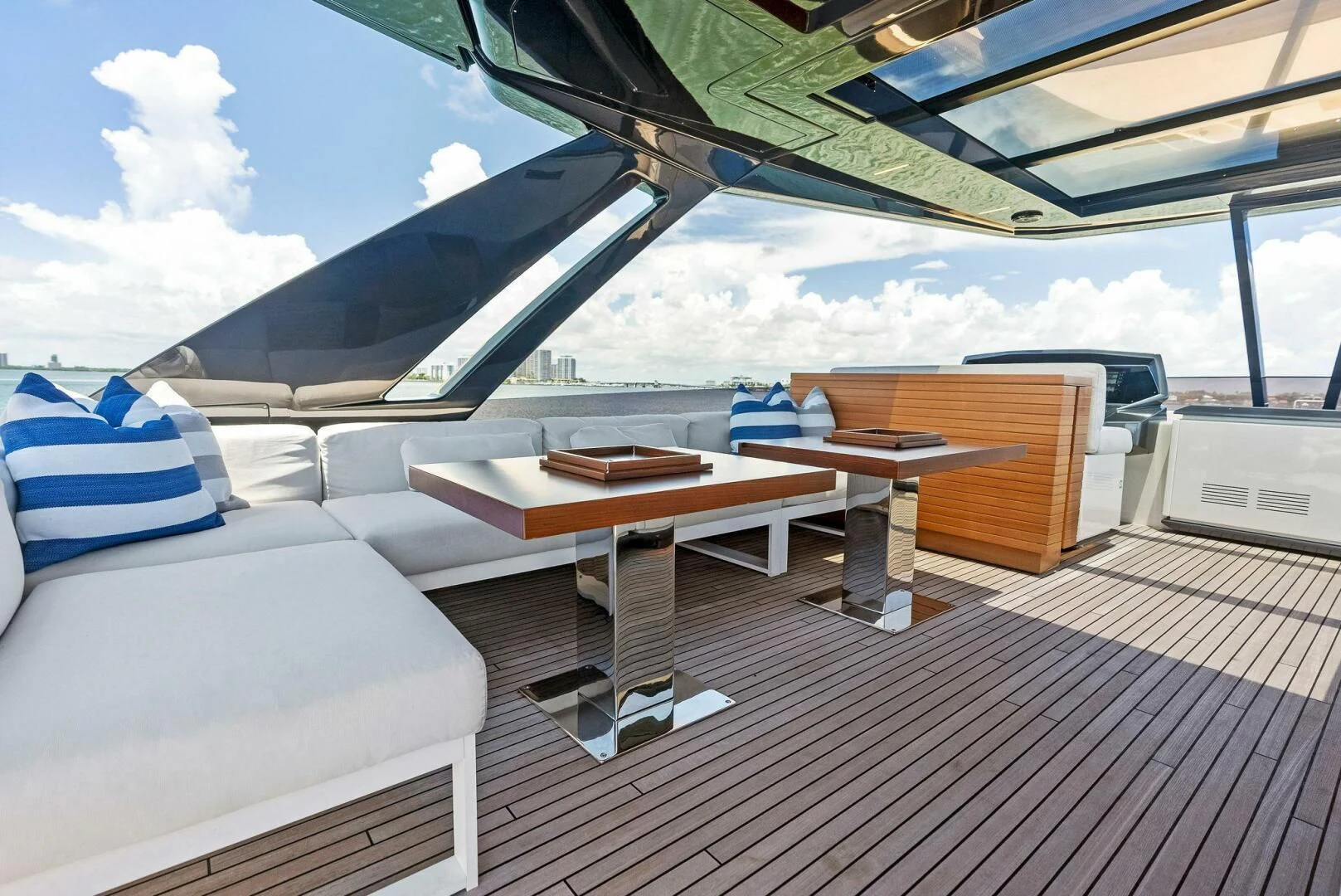 a room with a table and chairs aboard INEA Yacht for Sale