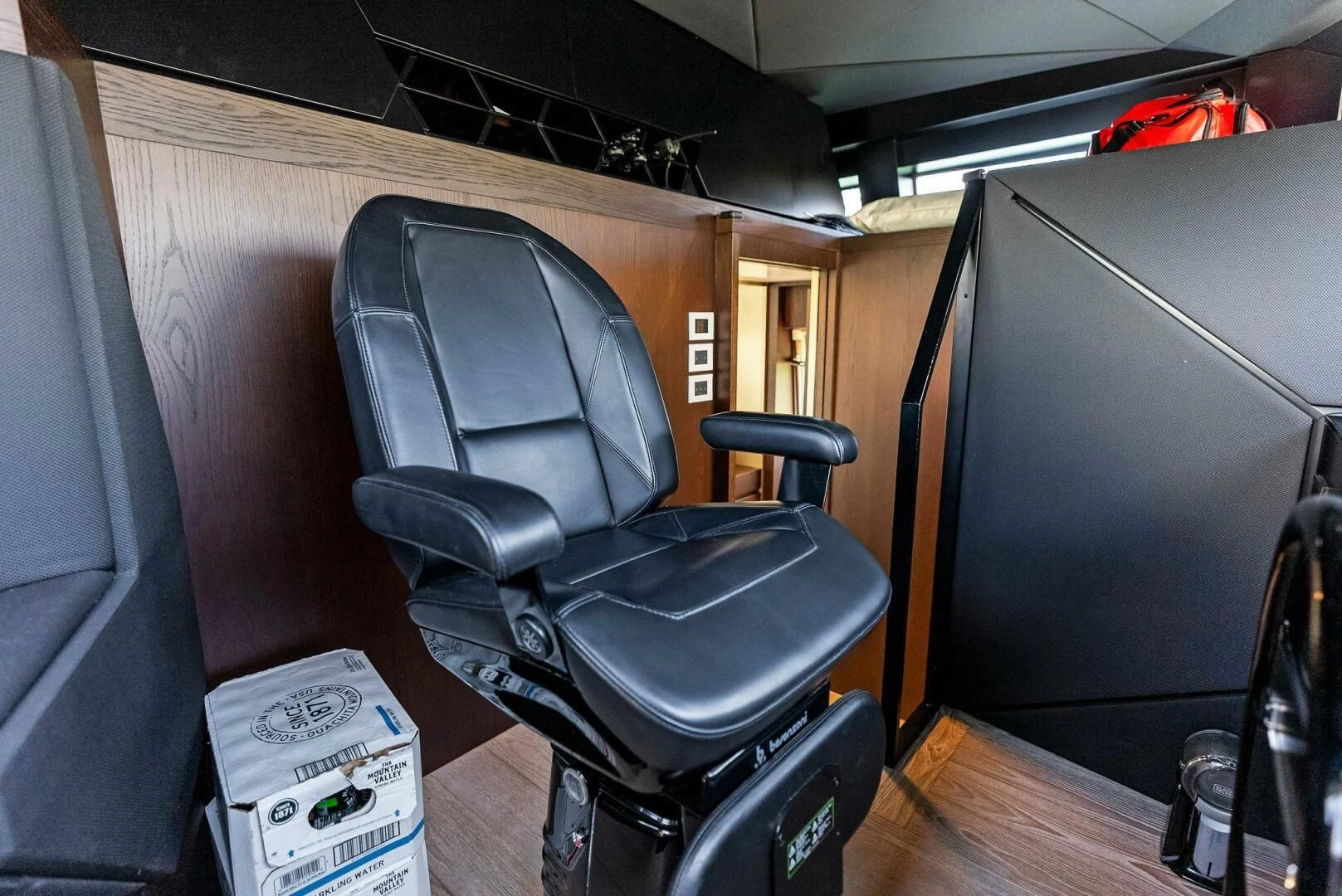 a chair in a room aboard INEA Yacht for Sale