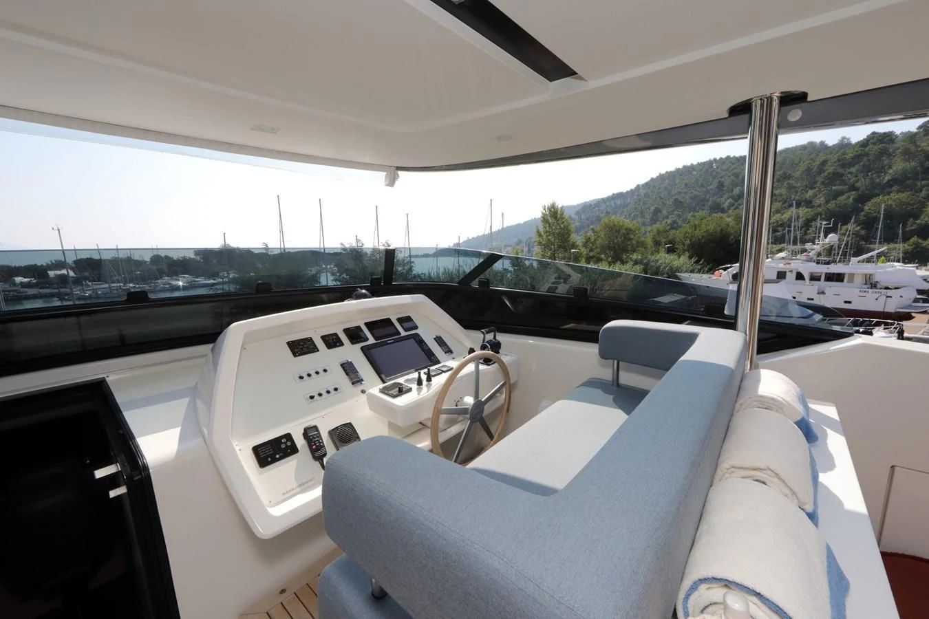 inside of a car aboard COBANA Yacht for Sale