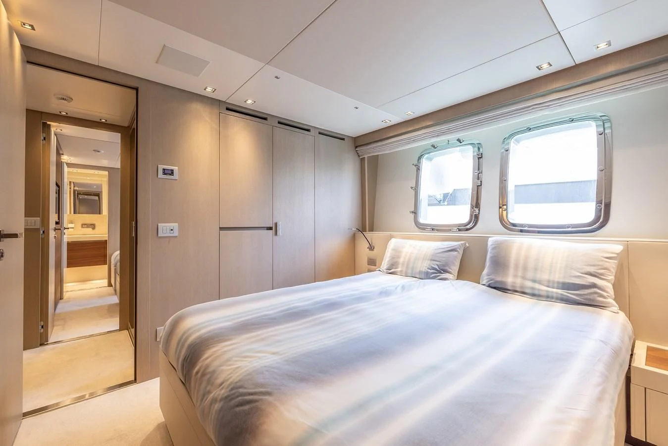 a bed in a room aboard COBANA Yacht for Sale