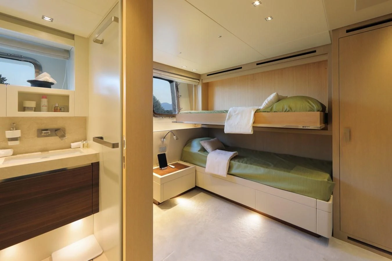 a room with a bed and a desk aboard COBANA Yacht for Sale