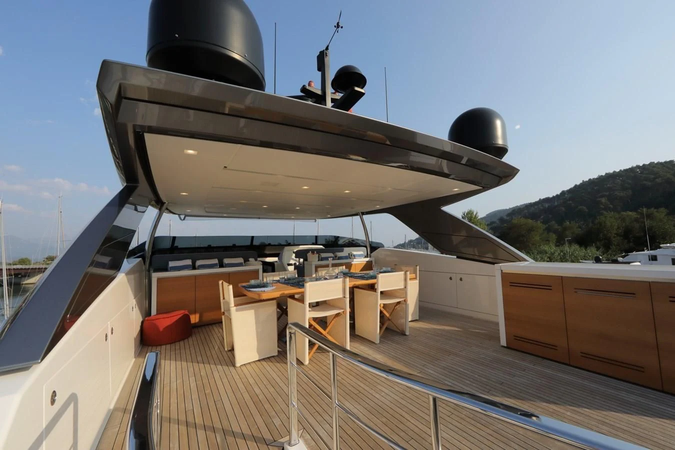 a deck with a large satellite dish on it aboard COBANA Yacht for Sale