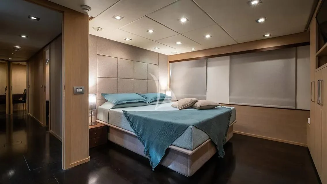 a bed in a room aboard ARIA Yacht for Sale