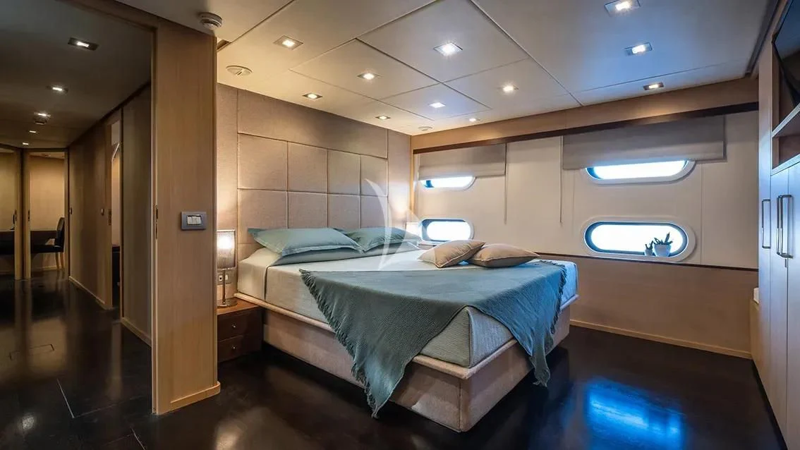 a bed in a room aboard ARIA Yacht for Sale