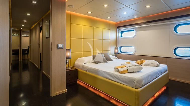 a bed in a room aboard ARIA Yacht for Sale