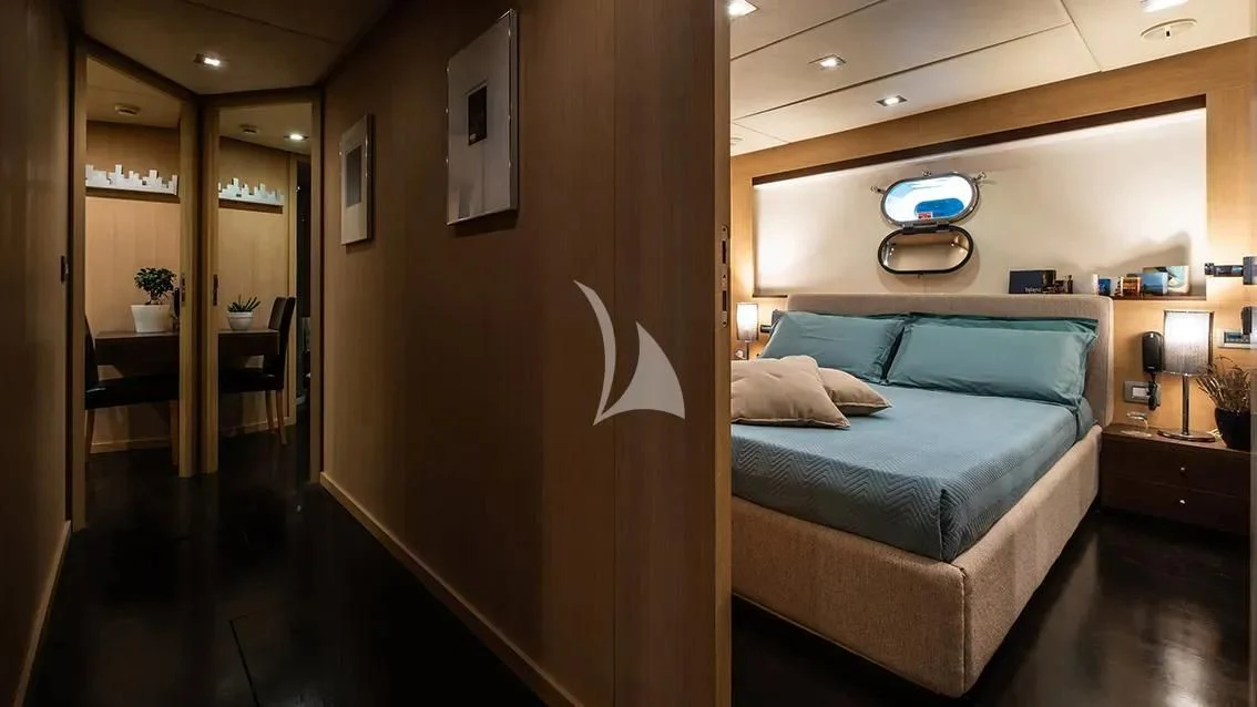a bed in a room aboard ARIA Yacht for Sale