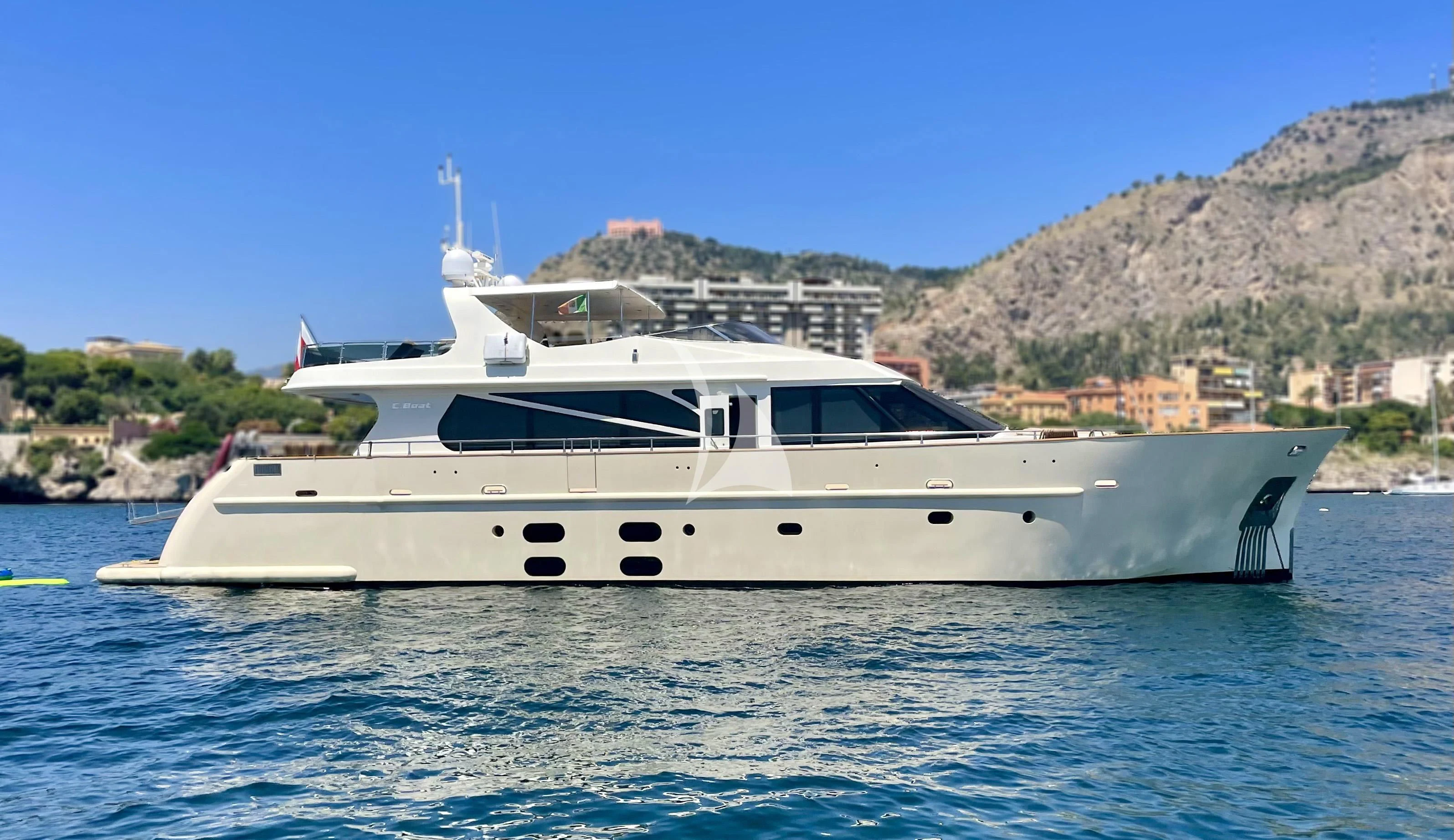 a white yacht in the water aboard ARIA Yacht for Sale