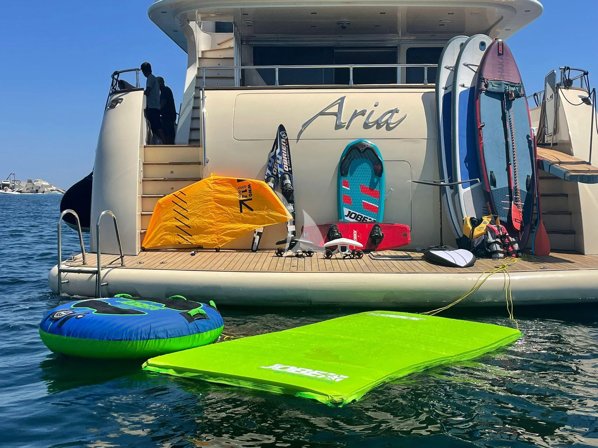 a boat with surfboards on it aboard ARIA Yacht for Sale