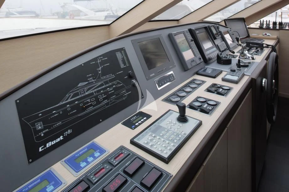 a machine with many cell phones on it aboard ARIA Yacht for Sale