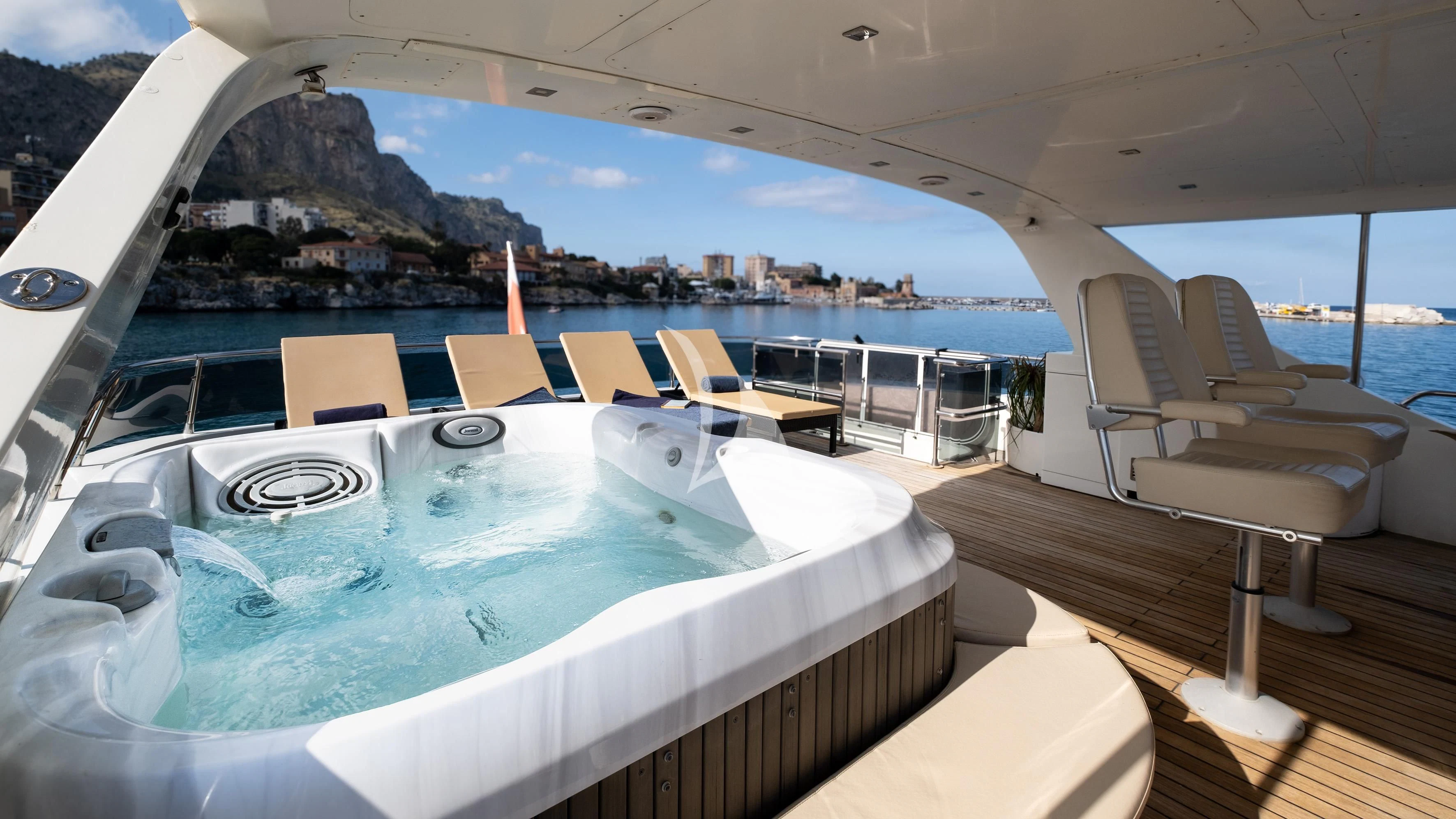 a large swimming pool aboard ARIA Yacht for Sale