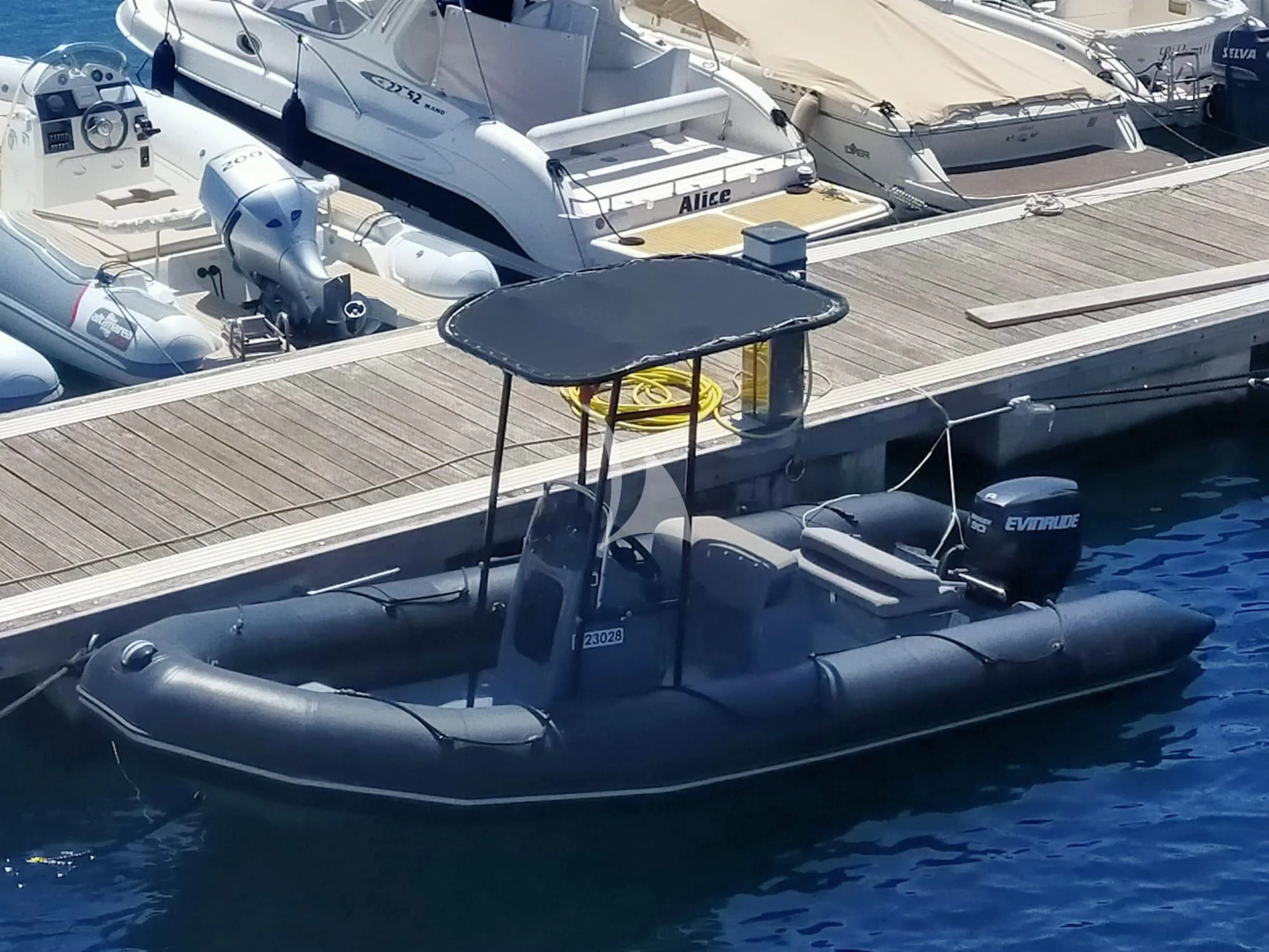 a boat docked at a pier aboard ARIA Yacht for Sale