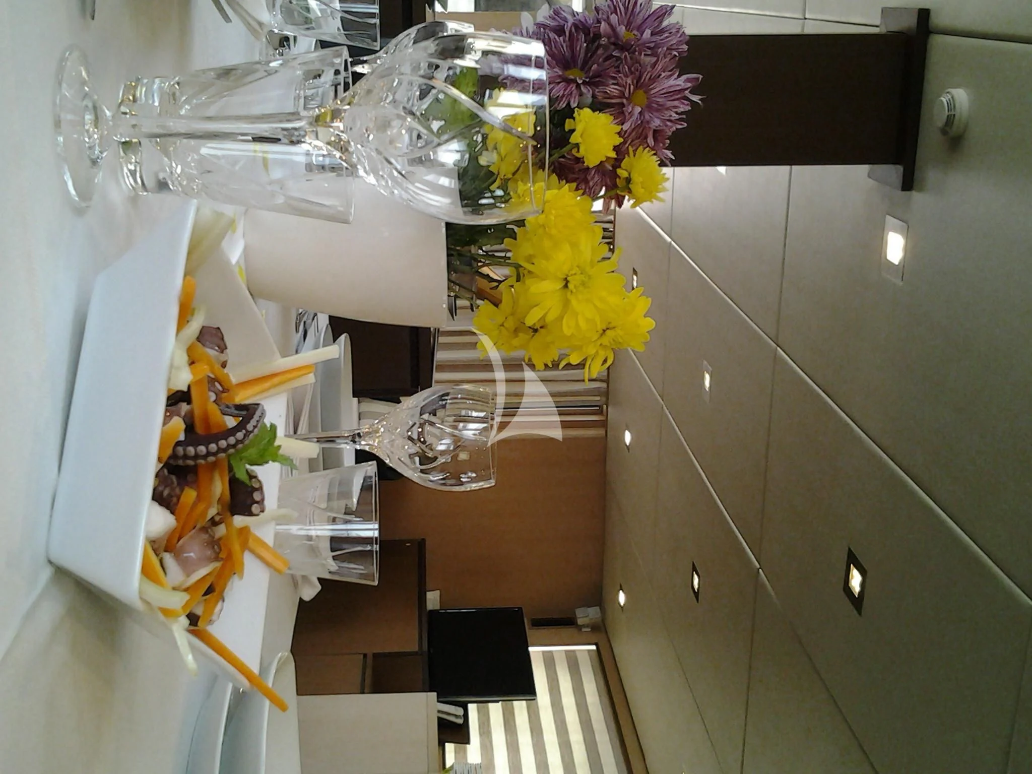 a group of flowers in a plastic bag on a counter aboard ARIA Yacht for Sale