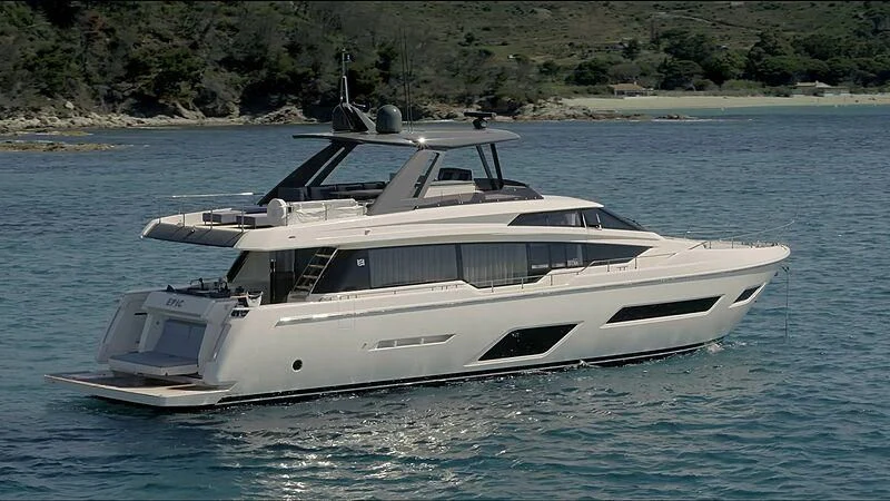 a white yacht in the water aboard EPIC Yacht for Sale