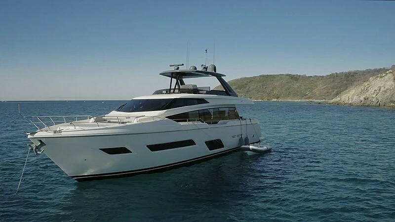 a white yacht in the water aboard EPIC Yacht for Sale