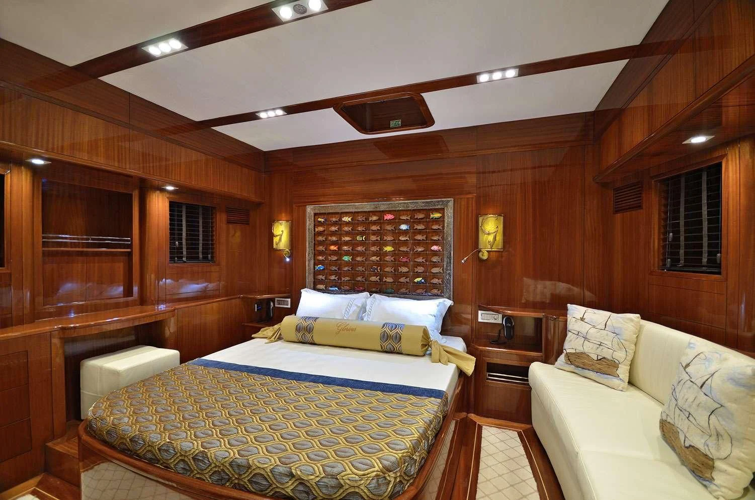 a room with a bed and a couch aboard G GIRL Yacht for Sale