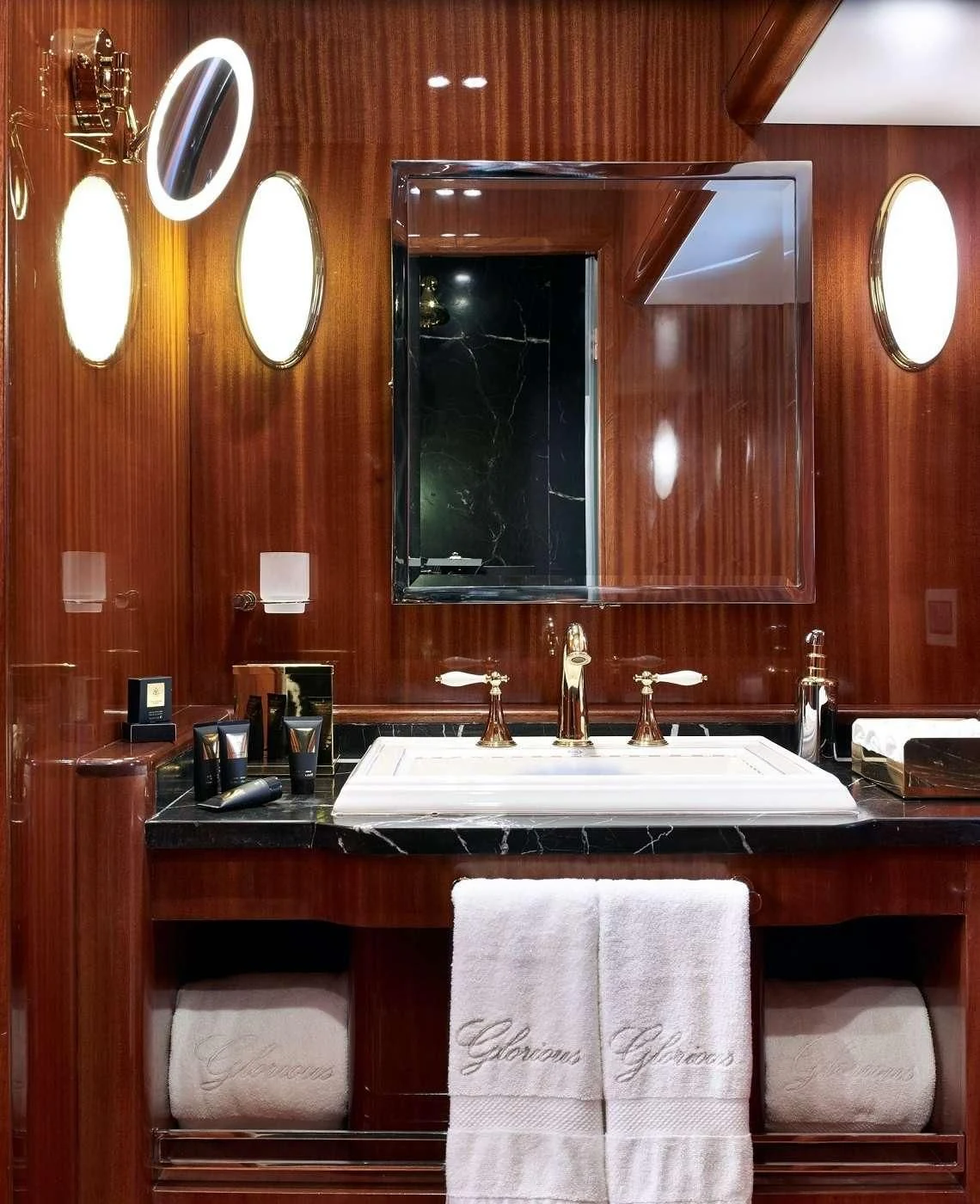 a bathroom with a large mirror aboard G GIRL Yacht for Sale