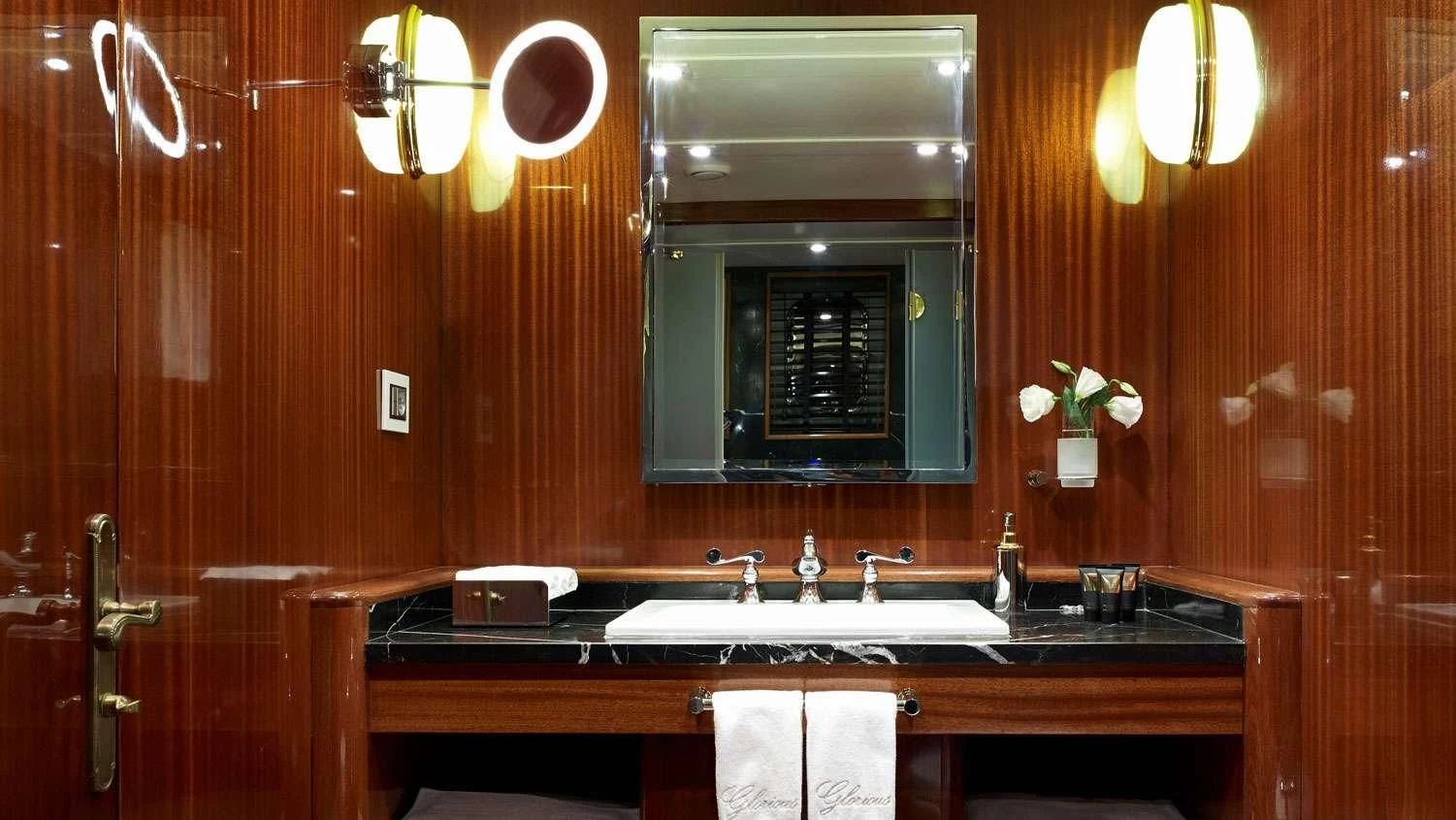 a bathroom with wooden walls aboard G GIRL Yacht for Sale