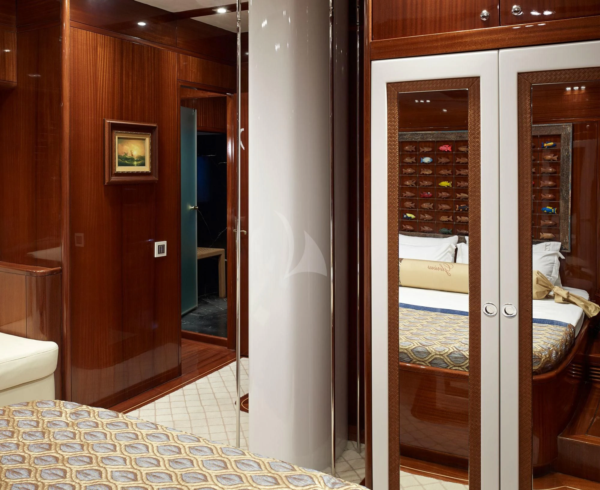 a room with a bed and a mirror aboard G GIRL Yacht for Sale