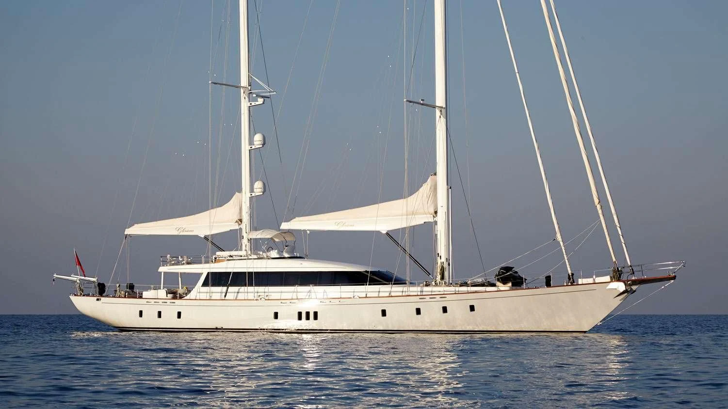 a white sailboat on the water aboard G GIRL Yacht for Sale