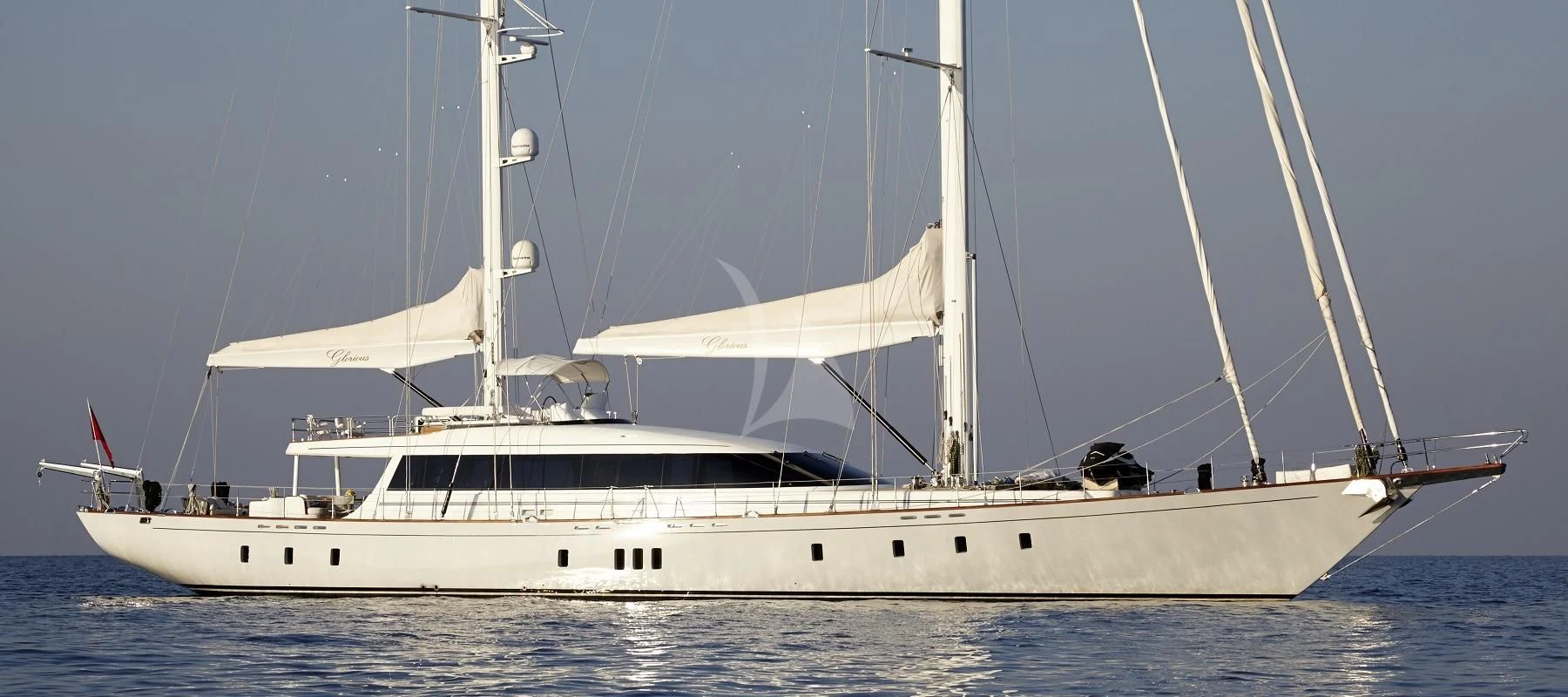 a white boat on the water aboard G GIRL Yacht for Sale