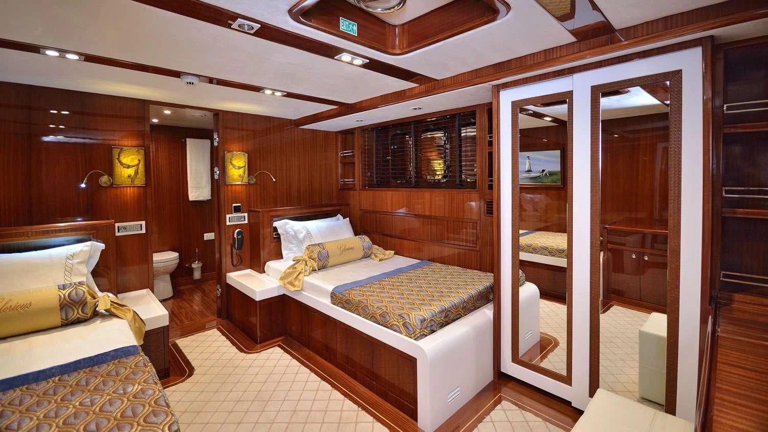 a room with a bed and a door aboard G GIRL Yacht for Sale