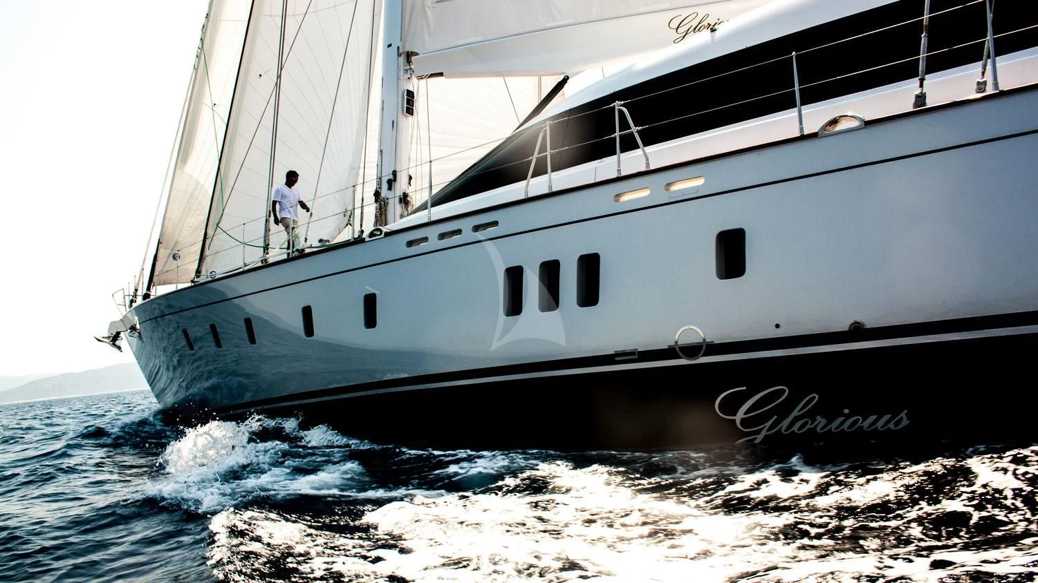 a white boat on the water aboard G GIRL Yacht for Sale