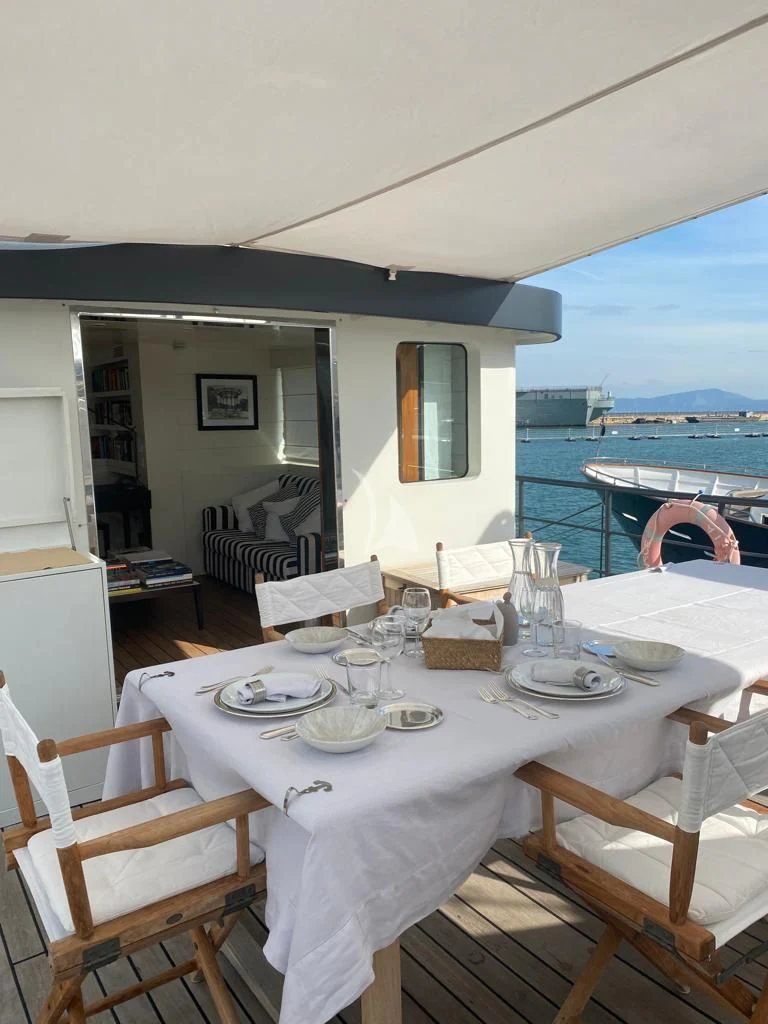 a table set for a meal aboard VERVECE Yacht for Charter