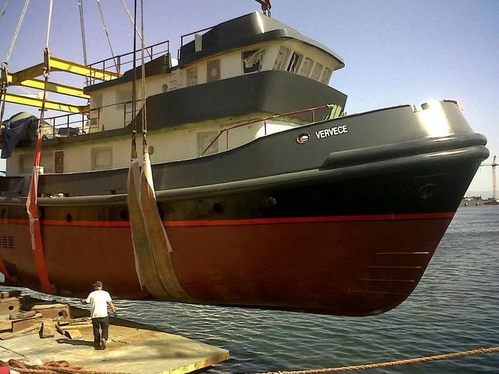 a large ship docked aboard VERVECE Yacht for Charter