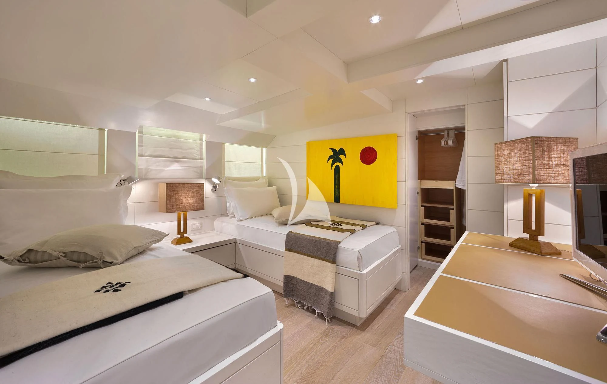 a bedroom with a large bed aboard VERVECE Yacht for Charter