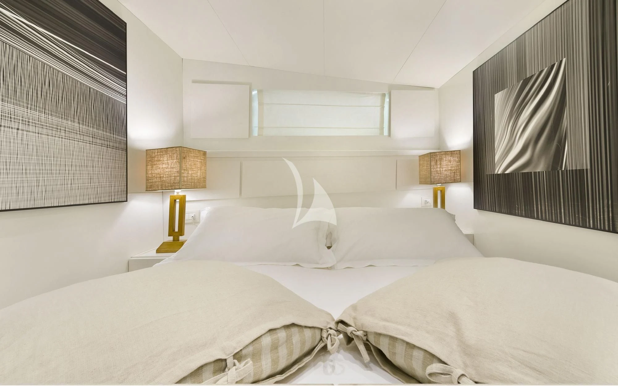 a couple of beds in a hotel room aboard VERVECE Yacht for Charter