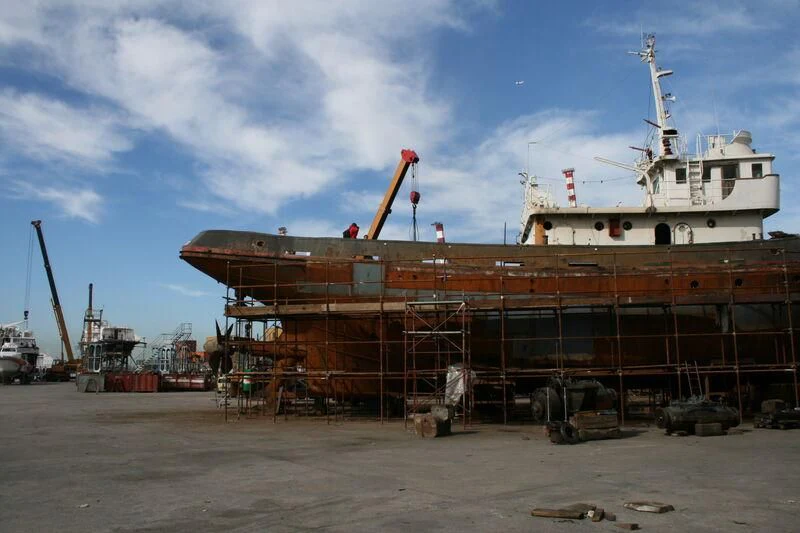 a large ship docked aboard VERVECE Yacht for Charter
