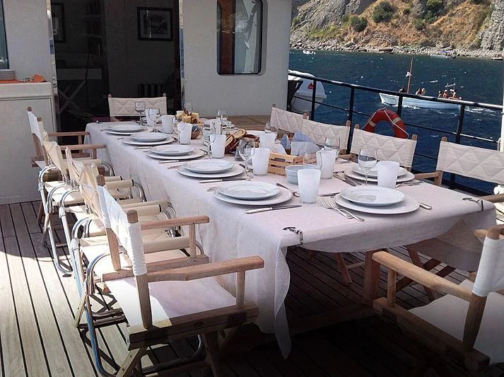 a table set for a meal aboard VERVECE Yacht for Charter