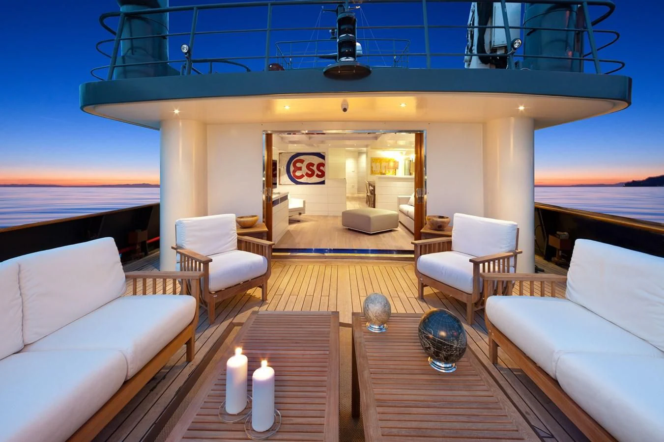 a living room with a large window aboard VERVECE Yacht for Charter