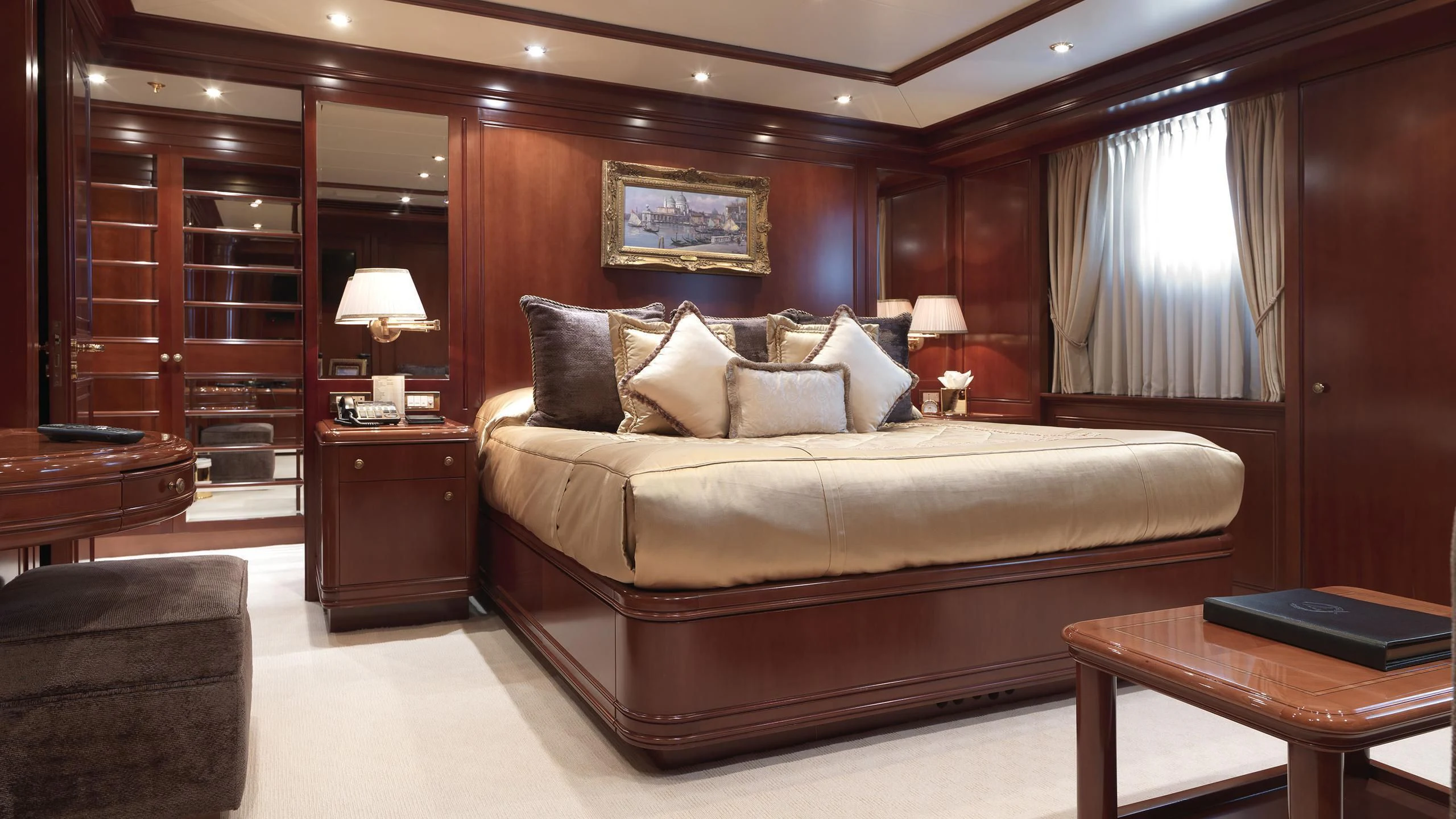 a large bed in a hotel room aboard APOGEE Yacht for Sale