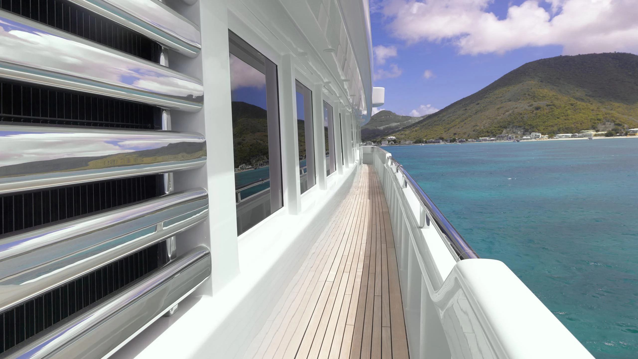 a deck of a boat on the water aboard APOGEE Yacht for Sale