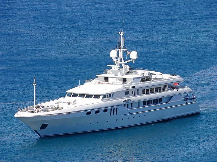 a large white boat in the water aboard APOGEE Yacht for Sale
