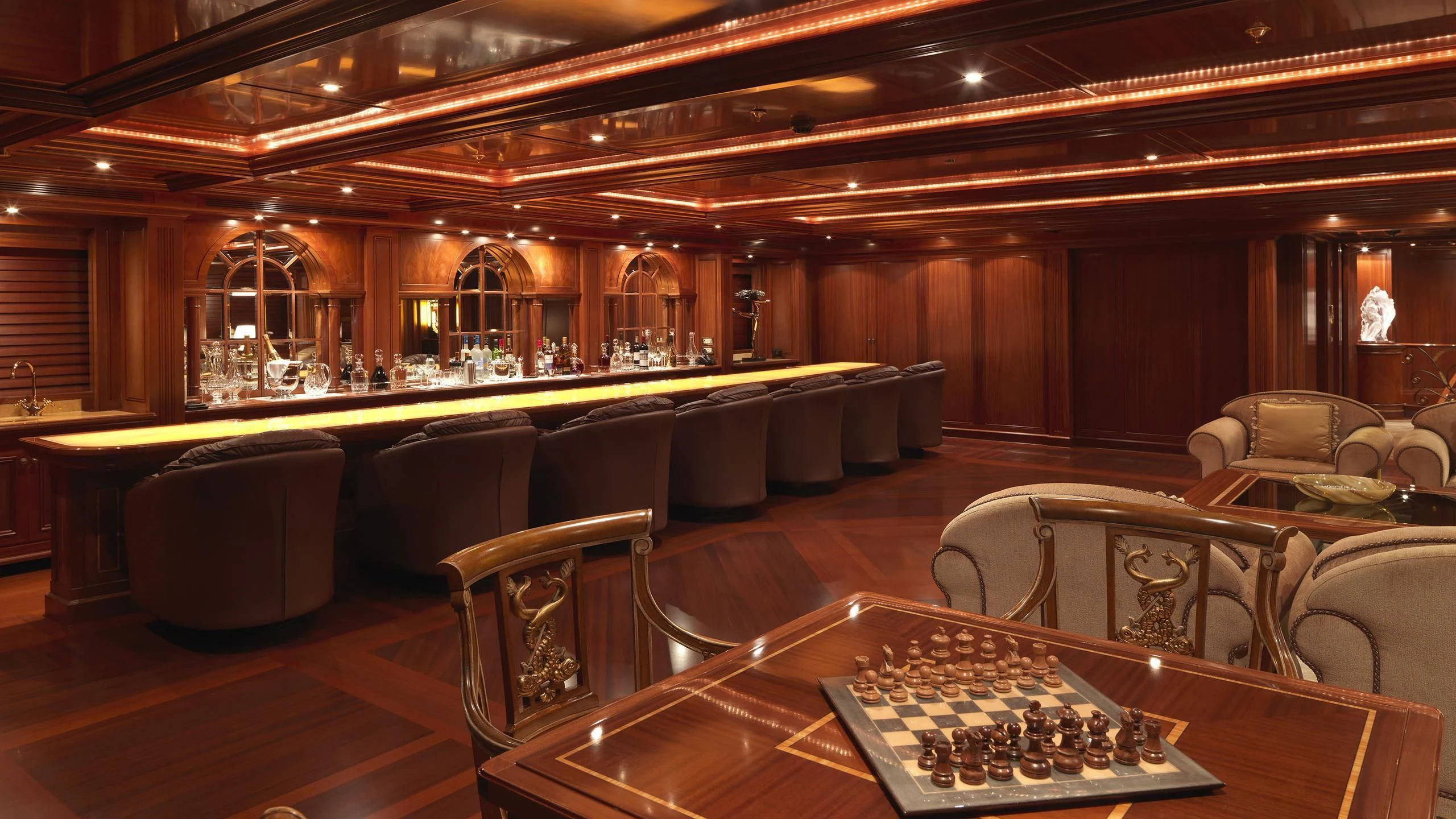 a large room with a pool table aboard APOGEE Yacht for Sale