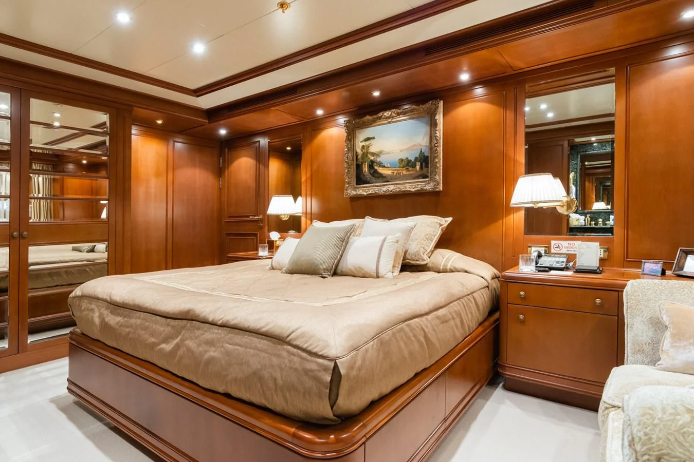 a bed in a room aboard APOGEE Yacht for Sale