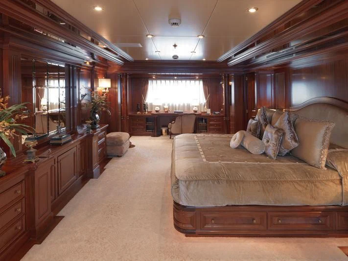 a large living room with a couch aboard APOGEE Yacht for Sale
